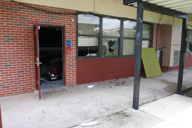 Authorities say teenage vandals smashed numerous windows at Jenkins Middle School on Sunday afternoon before fleeing the premises.