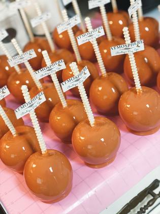 Pictured are candy apples that Atmosphere Boutique and Spa in downtown Palatka commissioned Brittani Wellon, owner of Sweets by Brittani, to make for the spa’s second anniversary last month. 
