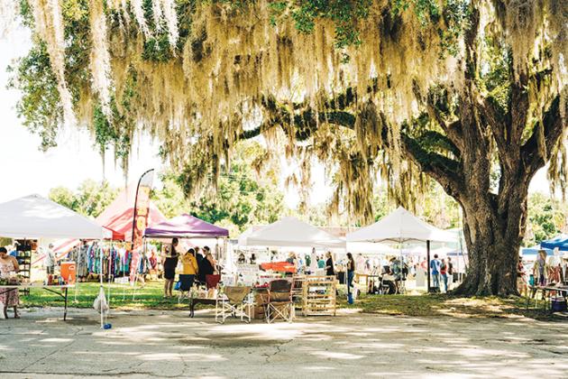 South Putnam residents and visitors peruse the group of vendors at a recent Crescent City Art & Farmers Market.