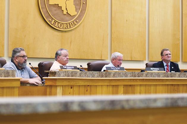 Members of the Putnam County Board of Commissioners listen to public input about the budget Tuesday during the board’s final budget hearing before the new fiscal year begins Saturday.