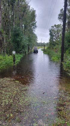 Photo courtesy of Cheri Sattelmeier. Palatka resident Cheri Sattelmeier's driveway is flooded Thursday afternoon off West River Road. 