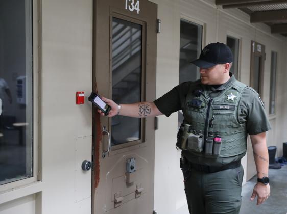 Corrections Deputy Michael Walker does an inmate check in the South Tower of the Putnam County Jail. (Photo courtesy of Putnam County Sheriff's Office)