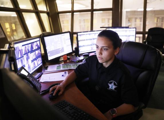 Corrections Deputy Loztris Vasquez monitors the computers in one of the towers at the Putnam County Jail. (Photo courtesy of the Putnam County Sheriff's Office)