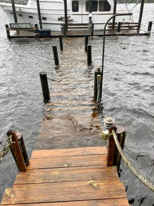 Photo courtesy of  Cathleen Holzknecht. A Satsuma dock is under water on the St. Johns River on Thursday.