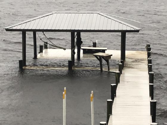 Photo courtesy of Tim Houghtaling. An area resident's boat docks on the St. Johns River were soon flooded due to rising water from Hurricane Ian.