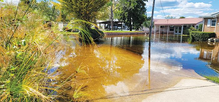 A Welaka neighborhood remains flooded Monday, less than a week after Hurricane Ian brushed over Putnam County.