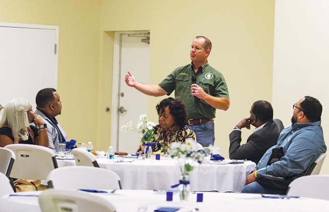 Putnam County Sheriff Gator DeLoach talks to faith leaders Monday about ways to bridge the divide between the Black community and law enforcement.