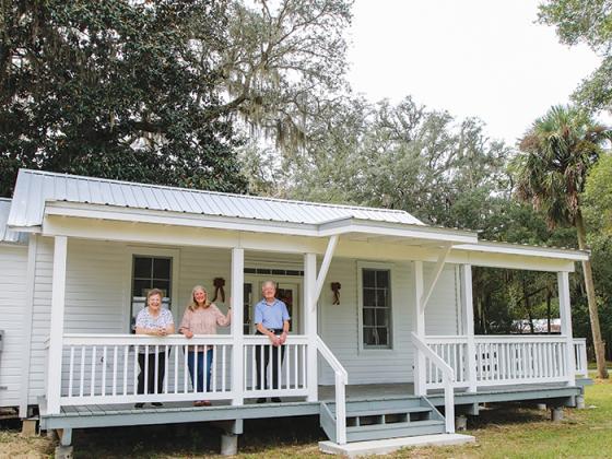 Florahome residents, from left, Betty Carnes, Meri-lin Piantanida and Ronnie Carnes stand on the porch of the historic Palmetto Hall in the West Putnam town.