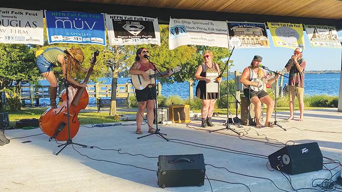 Blossomin’ Bone takes the stage as the final act during the North Florida Folk Network Fall Folk Fest at the Palatka riverfront on Saturday.