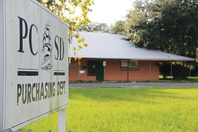 Overgrown grass and dirt collect on the East Palatka property that used to be Browning-Pearce Elementary School.