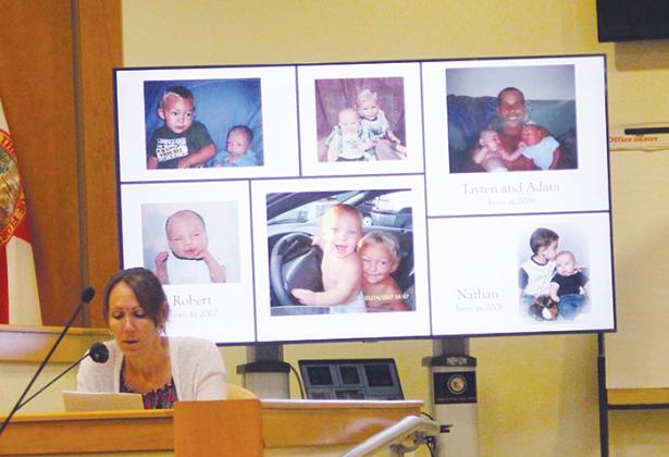 Deborah Benson, Tayten and Robert Baker’s step-grandmother, reads her victim impact statement Monday alongside photos of the slain boys as babies.