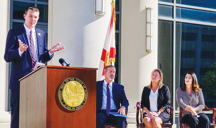 Putnam County Clerk of Courts Matt Reynolds speaks about property and mortgage fraud alongside his fellow Northeast Florida clerks Monday in Jacksonville.