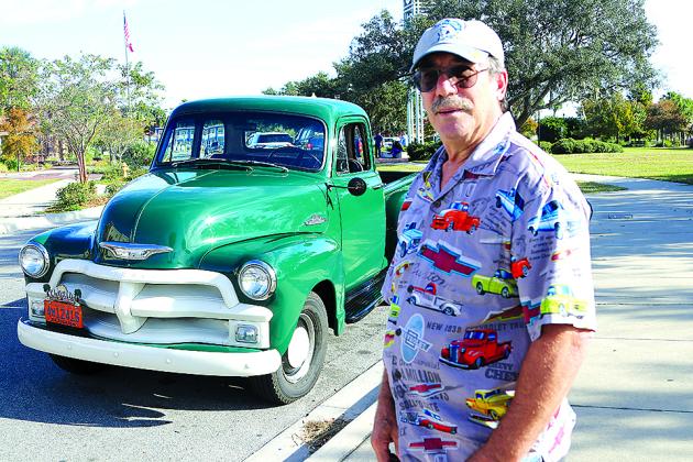 Gary Schneider of Bostwick is pictured with his 1955 Chevrolet pickup truck. The truck still has its original six-cylinder engine and is completely restored to its original look. Schneider, who is a member of the Azalea City Cruisers car club, will have the vehicle on display during this year’s 43rd annual Car and Truck Show Nov. 5 at Palatka Junior-Senior High School’s parking lot on Mellon Road. Spectators are free. The public is invited. (TRISHA MURPHY/Palatka Daily News)
