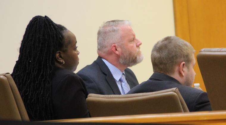 Murder suspect Mark Wilson Jr. sits with Public Defenders Courtney Davison and Brian Smith at trial Tuesday.