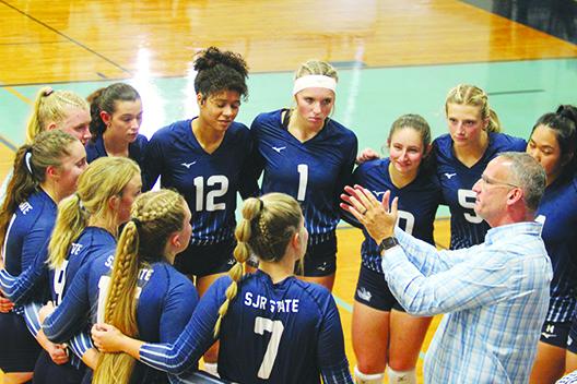 St. Johns River State Colleg volleyball coach Matt Cohen goes over strategy with his team during a timeout in a September match. (MARK BLUMENTHAL / Palatka Daily News)