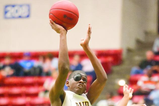 Crescent City’s Gary Mims puts up a shot against Hawthorne in the FHSAA 1A semifinal on Feb. 24, 2015 at the Lakeland Center. (Daily News file photo)