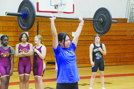 Sophie Chin took fifth place at the 129-pound class for first-year program Peniel Baptist Academy. (COREY DAVIS / Palatka Daily News)