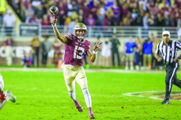 Florida State quarterback Jordan Travis fires a pass in his team’s 45-38 victory over Florida. (GREG OYSTER / Special to the Daily News)