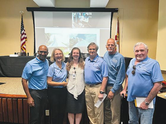 Historic preservationist Annie Delaroderie, third from left, stands with Palatka Water Works volunteers, from left to right, Danilo Sosa, Shann Purinton, David Clapp, Ken Carman and Bob Nelson after the Florida National Register Review Board gave unanimous approval of the nomination at the state level last week. 