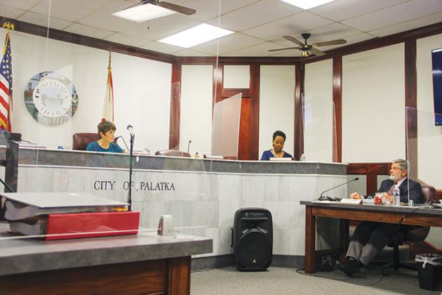 The Palatka City Commission discusses Hammock Hall with City Manager Don Holmes during Thursday’s commission meeting.