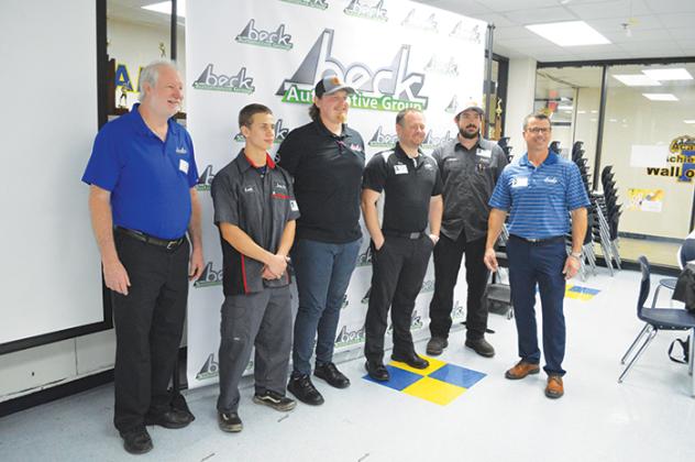 Professionals from Beck Automotive Group attend the Palatka Junior-Senior High School Automotive Industry Certification Award Luncheon on Wednesday at the school.
