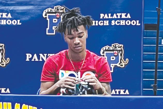 Palatka’s Chavaris Dumas looks down after announcing he will be playing his college ball at Western Kentucky University on Wednesday. (Photo courtesy of Chavaris Dumas)