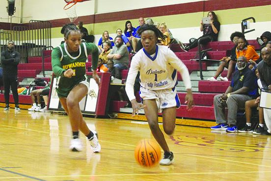 Palatka's Jhane Fountain (right) led the Panthers with 11 points Friday night in the District 5-4A final against North Marion. (MARK BLUMENTHAL / Palatka Daily News)