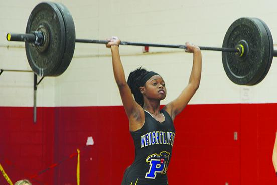 Palatka’s Ymira Passmore finished in the Top 10 in both the traditional (fourth) and Olympic (sixth) competitions at 101 pounds Saturday. (COREY DAVIS / Palatka Daily News)