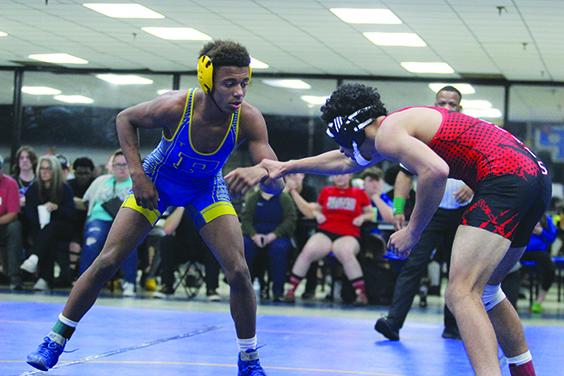 Palatka’s Mikade Harvey (left), shown wrestling a match against Baker County in December, will compete for the FHSAA 1A 138-pound championship this afternoon in Kissimmee. (MARK BLUMENTHAL / Palatka Daily News)