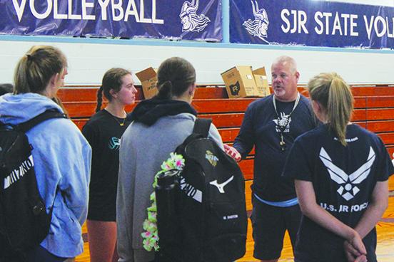 New St. Johns River State College volleyball coach Bill Bonham talks to a group of potential recruits during a session on Wednesday. (MARK BLUMENTHAL / Palatka Daily News)
