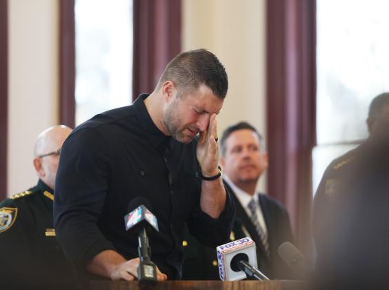 Courtesy of the Putnam County Sheriff's Office. Former University of Florida football player Tim Tebow tears up during a press conference about the Florida Inter-Agency Child Exploitation and Person Trafficking Task Force.