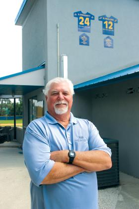 Bill Swaggerty stands in front of the press box at the Azalea Bowl in Palatka, where he was named the winning pitcher in 1975 when the Palatka South High School Braves won the state championship. (TRISHA MURPHY/Palatka Daily News)