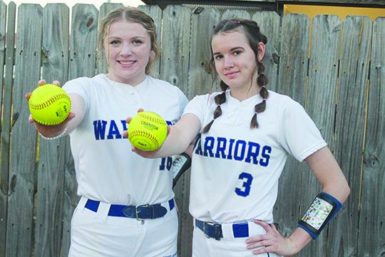 Peniel Baptist Academy’s Lexi Peacock (left) and Alexis Wallace have been a dynamite 1-2 pitching combination the last three years. (MARK BLUMENTHAL / Palatka Daily News)
