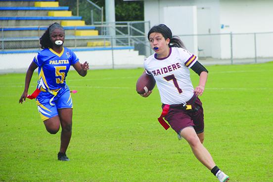  Crescent City’s Kirabella Williams tries to get to the outside as Palatka’s Samaria Williams tries to chase her down during Wednesday’s flag football game at Bennett-Cooper Field at Veterans Memorial Stadium. (COREY DAVIS / Palatka Daily News)