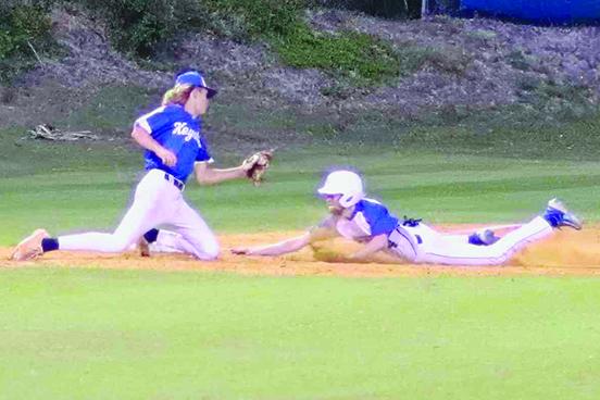 Palatka’s Micah Harper slides safely into third base during the third inning as Keystone Heights third baseman Austin Musgrove is late with the tag during Tuesday’s game at the Azalea Bowl. (RITA FULLERTON / Special to the Daily News)
