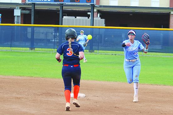 St. Johns River State College’s Nicolette Luzzi-Salerno throws on to first base to complete a double play on South Florida State’s Sanalys Guzman in the first inning of Saturday’s second game of a doubleheader. Forced out at second on the play is South Florida’s Ashton Lewis. (MARK BLUMENTHAL / Palatka Daily News)