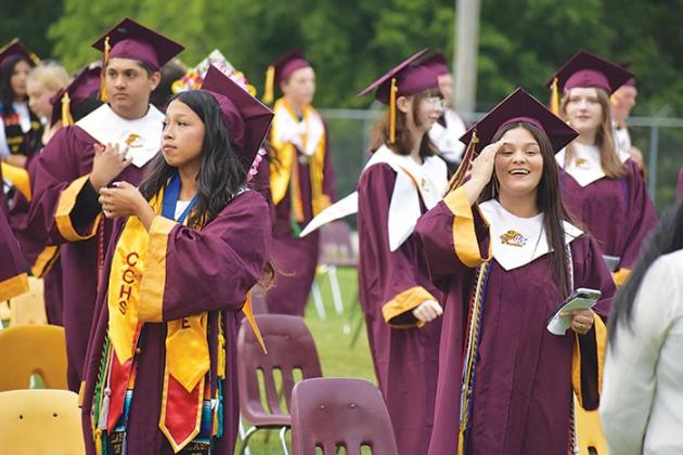 Crescent City Junior-Senior High School graduates take their seats during the school's commencement ceremony Thursday evening.