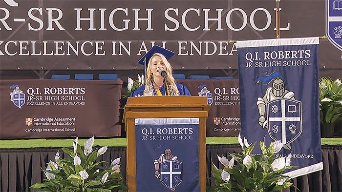 Photo courtesy of the Putnam County School District   Samantha Harper gives a farewell address to her classmates Saturday at the Q.I. Roberts Junior-Senior High School commencement ceremony.