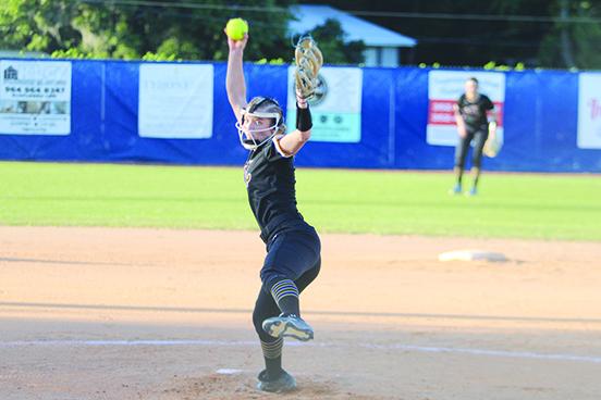 Palatka’s Molly Allbritton sets to throw a first-inning pitch against host Keystone Heights on Tuesday night. (MARK BLUMENTHAL / Palatka Daily News)