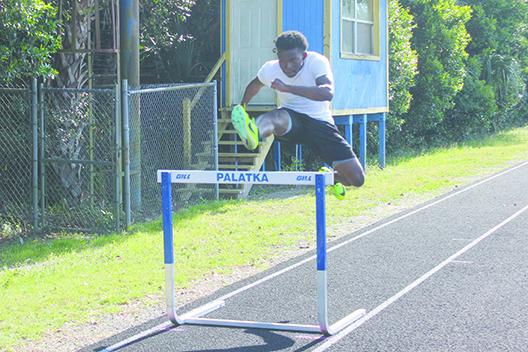 Palatka's Derick Holland, shown jumping a hurdle while practicing the 400-meter intermediate hurdles, will compete for state medals at the FHSAA 2A championship at the University of North Florida on Thursday. (MARK BLUMENTHAL / Palatka Daily News)