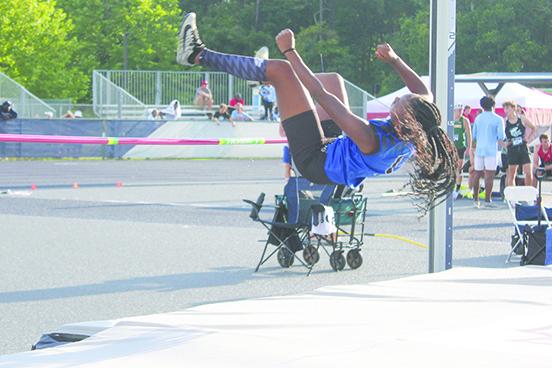 Palatka’s Destiny Williams makes her only successful leap Thursday night in the high jump, clearing 1.42 meters. (MARK BLUMENTHAL / Palatka Daily News)