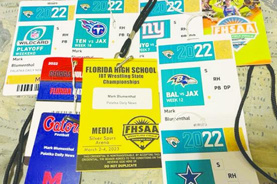 Some of the press passes sports editor Mark Blumenthal wore from this past 2021-22 season. (MARK BLUMENTHAL / Palatka Daily News)