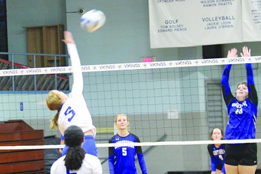 Peniel Baptist’s Alexis Wallace goes up for a kill attempt during a volleyball match last September at Tuten Gymnasium against Gainesville Countryside Christian. (MARK BLUMENTHAL / Palatka Daily News)