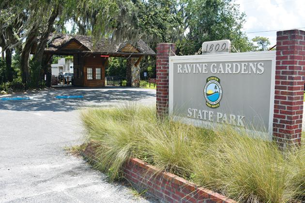 A sign leads to Ravine Gardens State Park in Palatka, which will have its 90th Anniversary Celebration from 4–8 p.m. Saturday. 