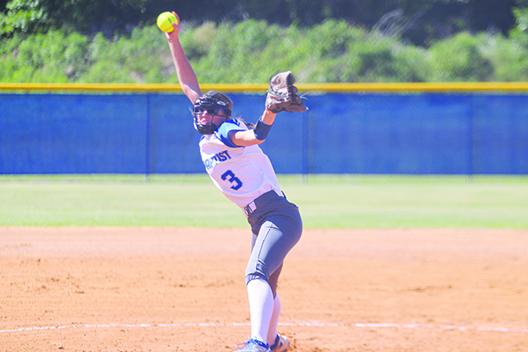 Peniel Baptist’s Alexis Wallace gets set to throw a pitch during her 12-strikeout, three-hit performance in a 7-0 shutout over Daytona Beach Father Lopez in the District 4-2A tournament final on May 3. (MARK BLUMENTHAL / Palatka Daily News)