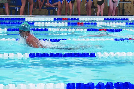 Putnam Sharks swimmer Evan Williamson competes during his team's first meet at home on June 3 at Putnam Aquatic Center. (MARK BLUMENTHAL / Palatka Daily News)