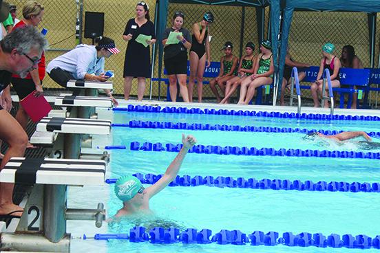 Ansel Partridge gives a thumbs up after winning the boys’ 13-14-year-old 100-yard individual medley in 1:26.51. (MARK BLUMENTHAL / Palatka Daily News)