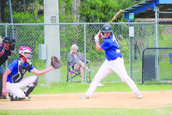 Melrose Babe Ruth 15-and-under all-star Rodney Blackwelder watches a pitch go past him as Melrose Babe Ruth 13-and-under catcher Ethan Franklin gets ready to catch the pitch during Wednesday’s scrimmage between the teams. (COREY DAVIS / Palatka Daily News)