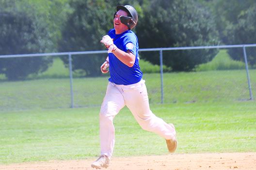 Melrose’s Rodney Blackwelder scampers to third base on a triple during Saturday’s District 5 15-U championship against Santa Fe. (Priscilla Screen / Submitted to the Daily News)