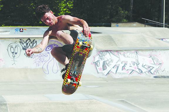 An unidentified skateboarder flies through the air at Treaty Park in St. Augustine. (COREY DAVIS / Palatka Daily News)